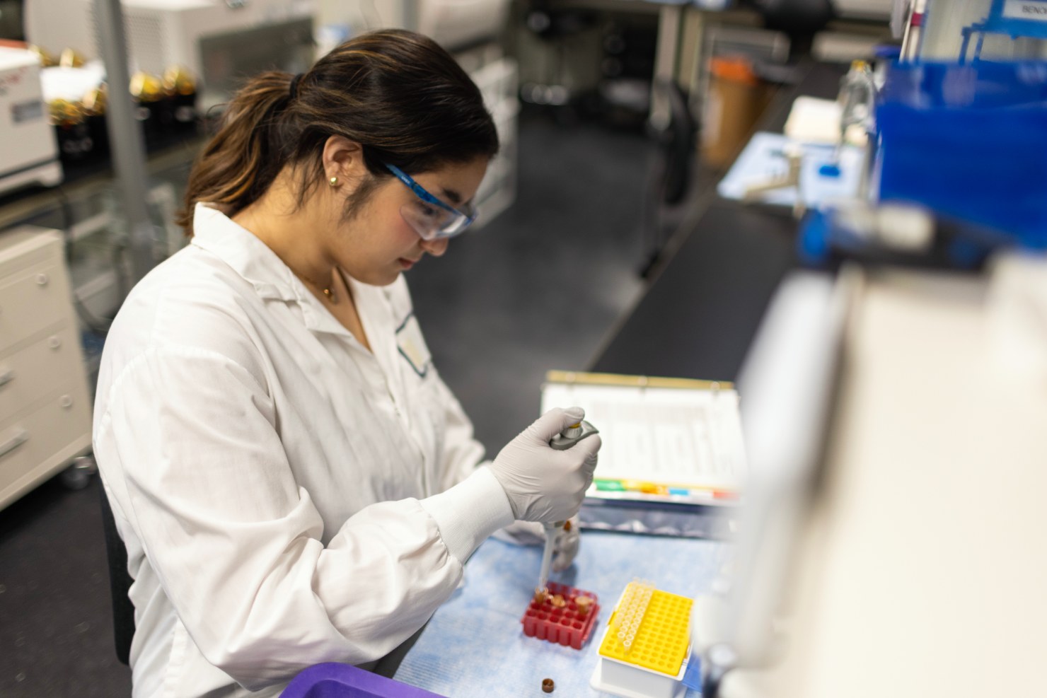 Scientist performing basophil activation test using flow cytometry