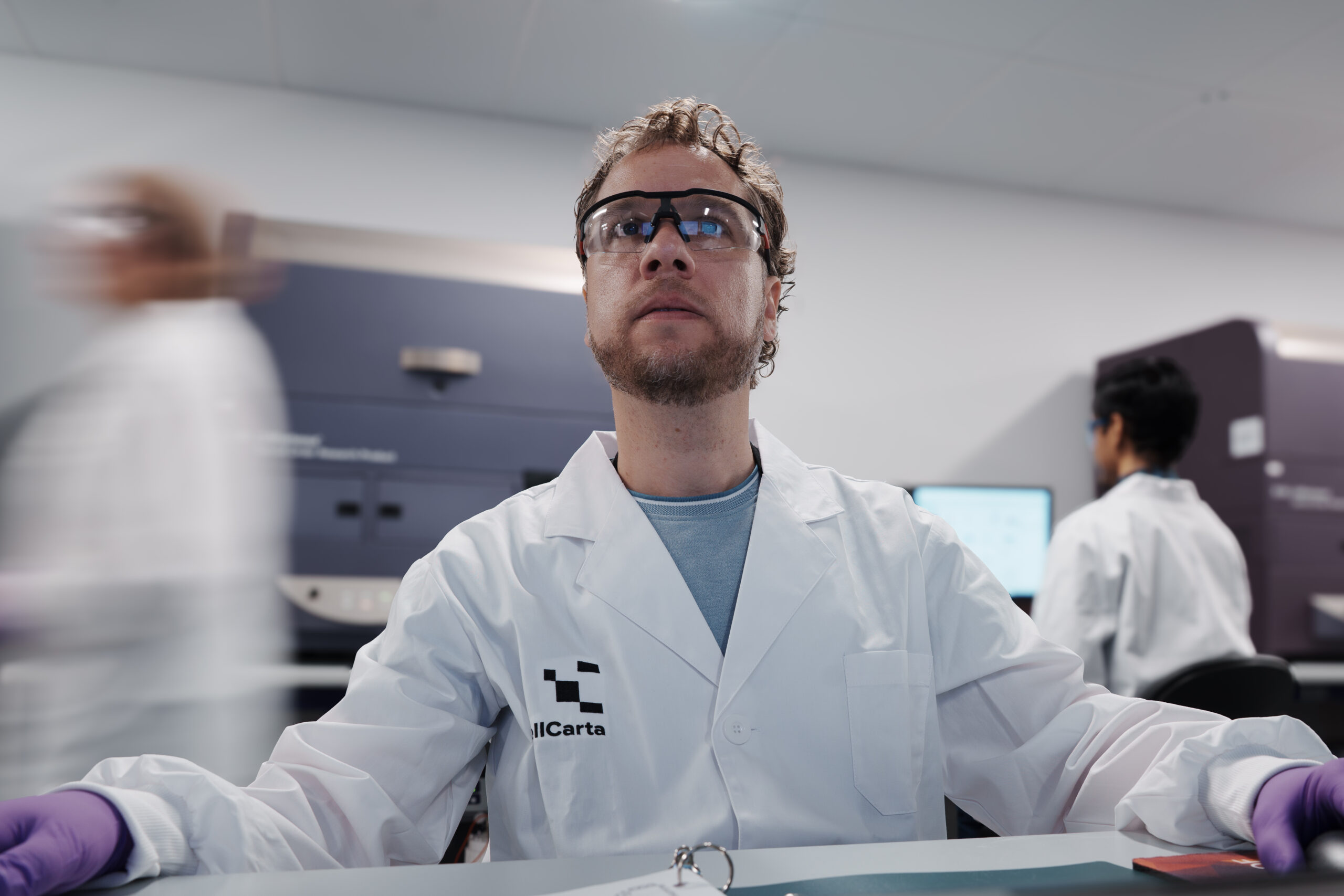 Scientist working at a computer workstation.
